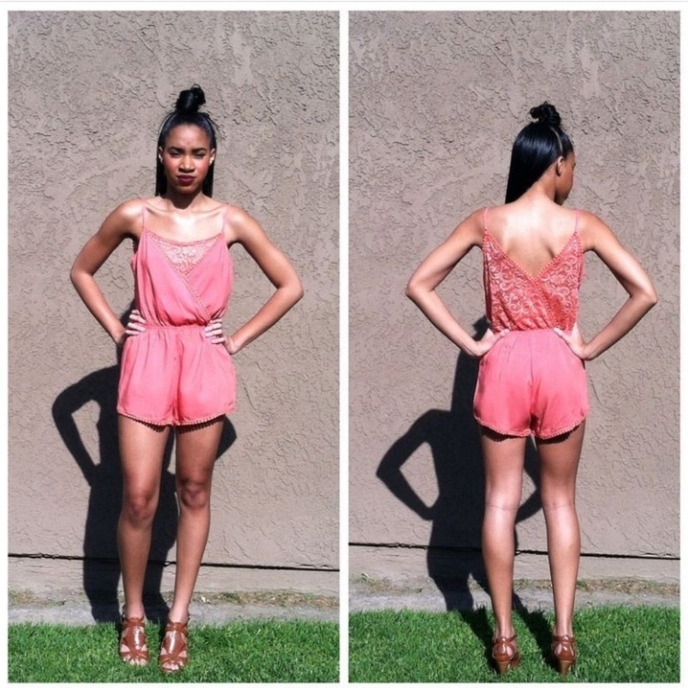 Coral lace romper also sold in navy blue